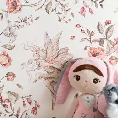 One of the walls was covered with wallpaper in a floral pattern