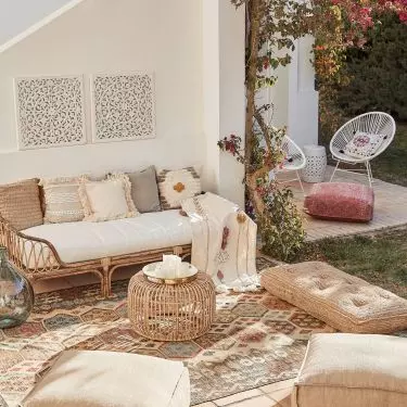 Add coziness to your arrangement with textiles