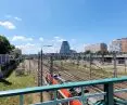 Railroad area between Theatre Bridge and Kaponiera stripped of trees by PKP; in the background is the Bałtyk office building