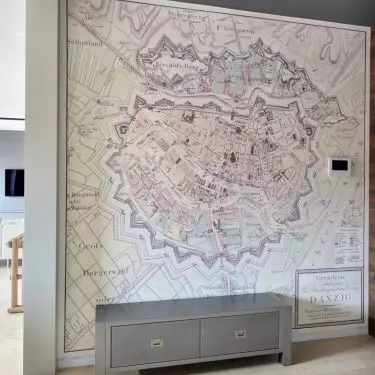 In the hallway there is a wallpaper with a map of Gdansk