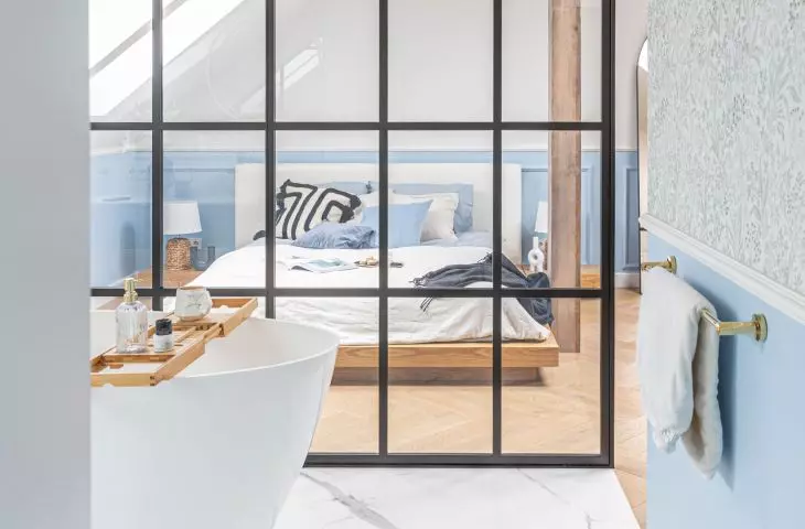 The bath was separated from the bedroom by a loft wall