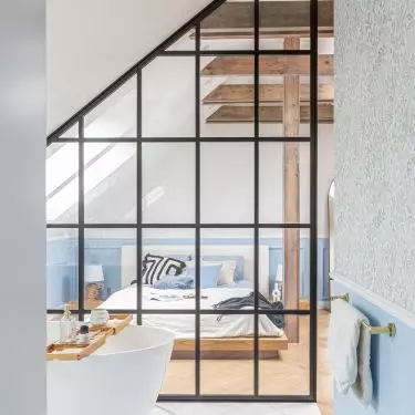 The bath was separated from the bedroom by a loft wall