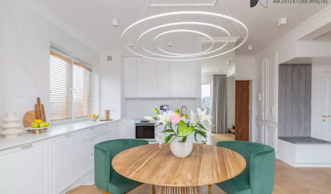 The kitchen area is marked by hexagonal tiles on the floor
