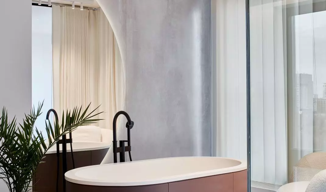 The bedroom has a bathtub