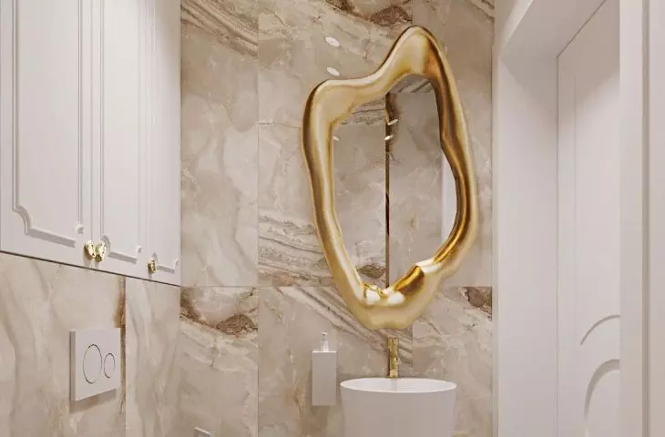 A striking mirror is the focal point of the arrangement