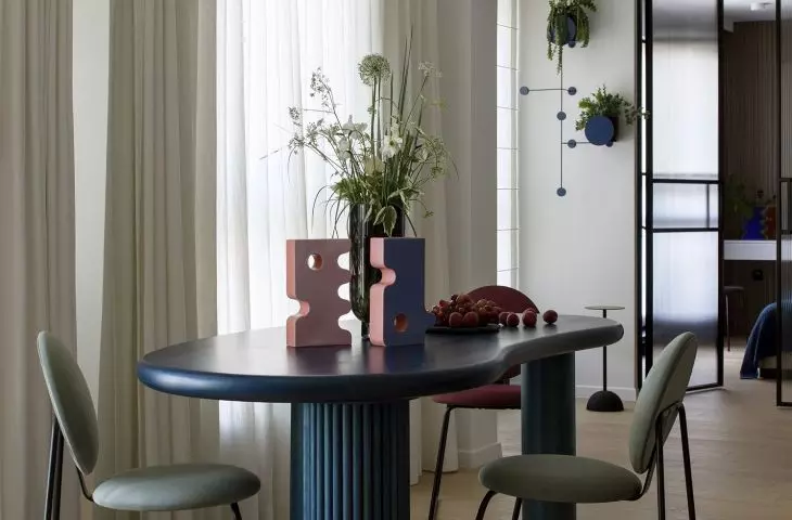 Cobalt dining table has an interesting form