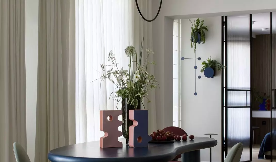 Cobalt dining table has an interesting form