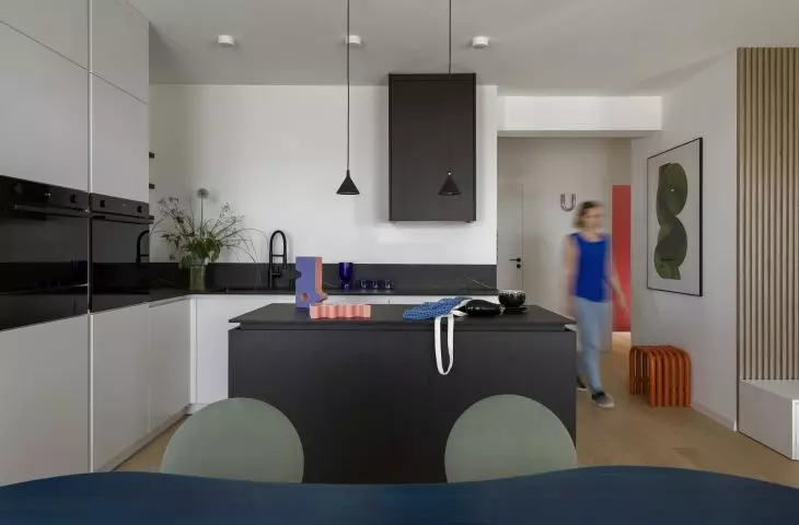 The white kitchen was complemented with contrasting black elements