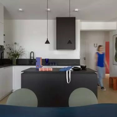 The white kitchen was complemented with contrasting black elements