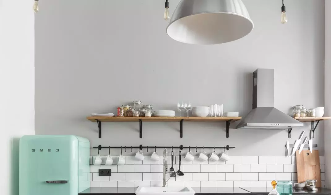 Light bulb on a long cable is the lighting characteristic of the industrial style
