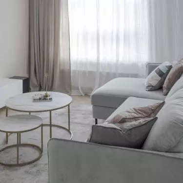 Linen curtains warm up the interior