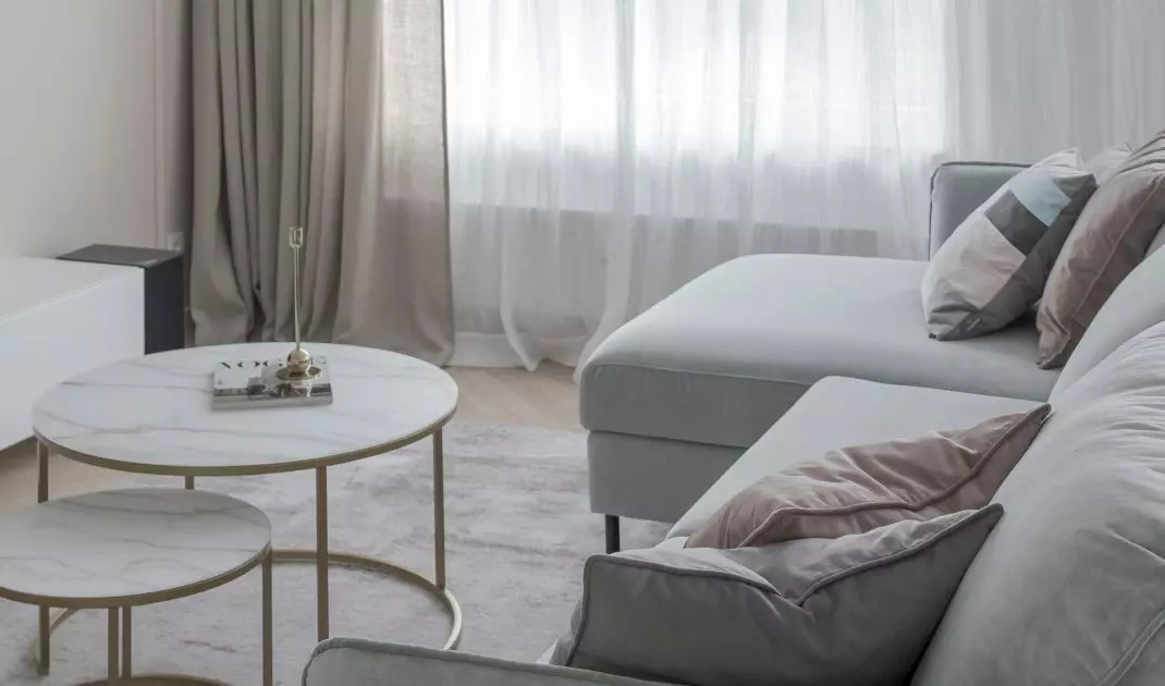 Linen curtains warm up the interior