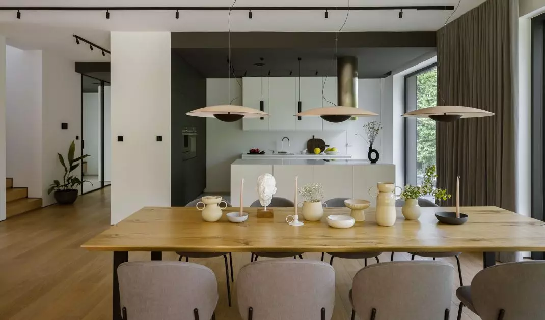 In the dining room stands a massive wooden table