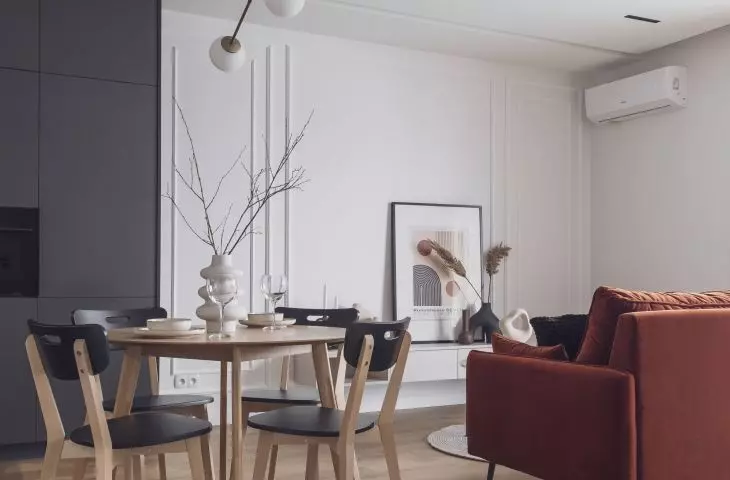 The dining area creates a seamless transition between the kitchen and living room