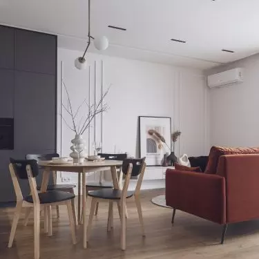 The dining area creates a seamless transition between the kitchen and living room