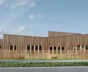the various parts of the building, although planned on a similar plan, differ in height and shape of the roofing