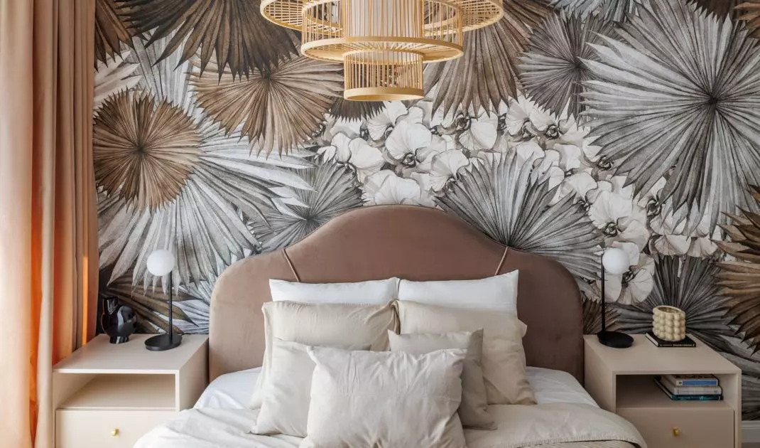 The most decorative element is wallpaper with a floral motif. 