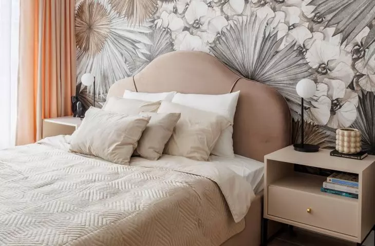 Apricot wallpaper creates a nice contrast with the muted interior colors