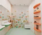 The bathroom is in a similar color scheme to the entire studio