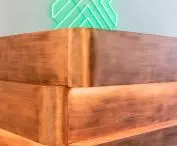 counter detail with neon logo in the background