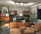 Paweł Wołejsza's private apartment, and in it, among other things, an exposed prefabricated reinforced concrete slab and a rescued communist-era Drzwotechnik modular furniture cabinet