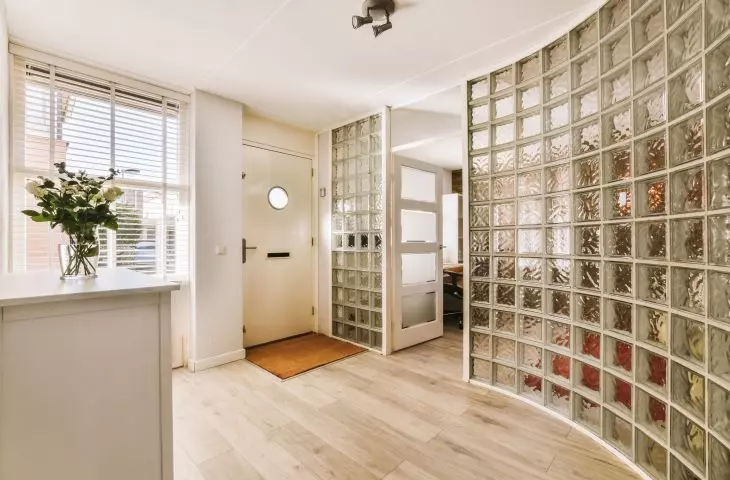 Luxafers are once again making a comeback in interiors. A wall of glass blocks is a striking way to divide even small spaces.