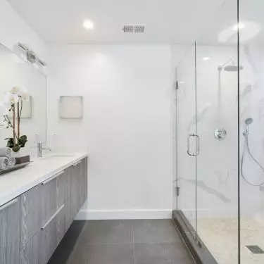 You can have a large, comfortable shower in a small bathroom. The difference between this solution and a bathtub is fundamental - a glass shower cubicle does not visually reduce the size of the bathroom.