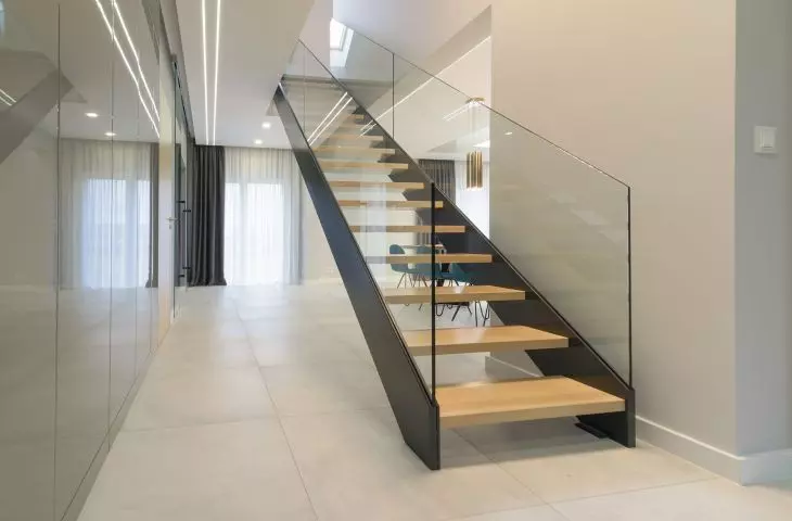 Popular materials for staircases include wood, concrete, metal, stone, glass, laminates or wood-like panels. 