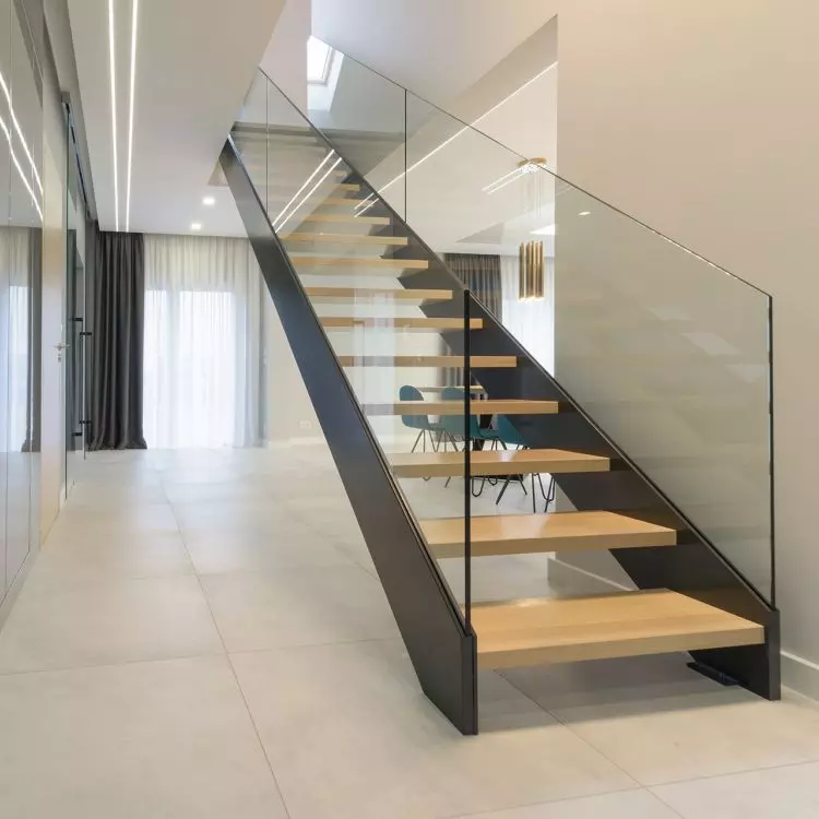 Popular materials for staircases include wood, concrete, metal, stone, glass, laminates or wood-like panels. 