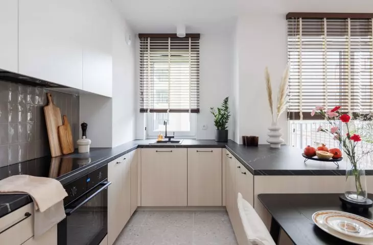 The kitchen has been arranged in a U-shape