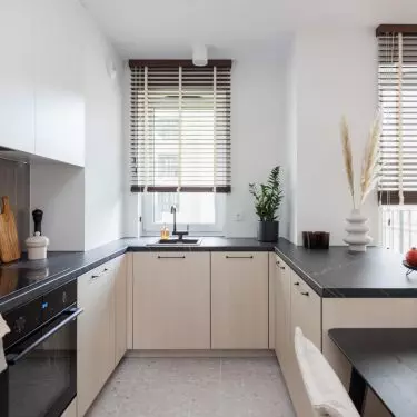 The kitchen has been arranged in a U-shape