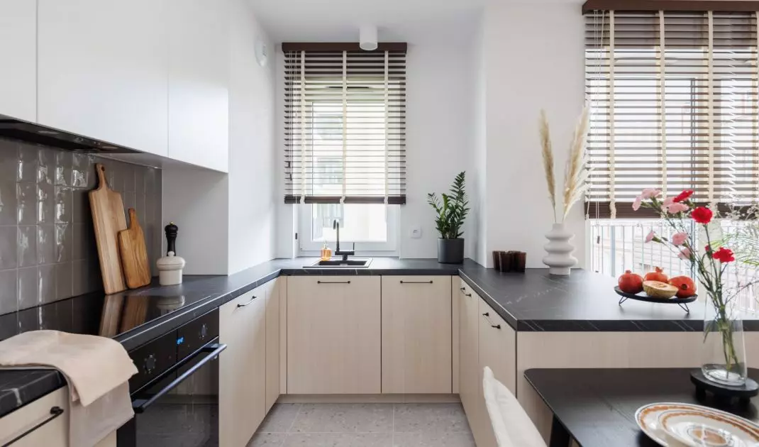 The kitchen has been arranged in a U-shape