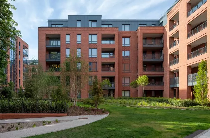 The building fits in with its historic surroundings