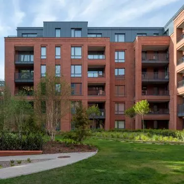 The building fits in with its historic surroundings