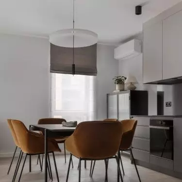 Next to the kitchenette is the dining area