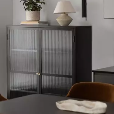 A display case is the perfect place to store tableware