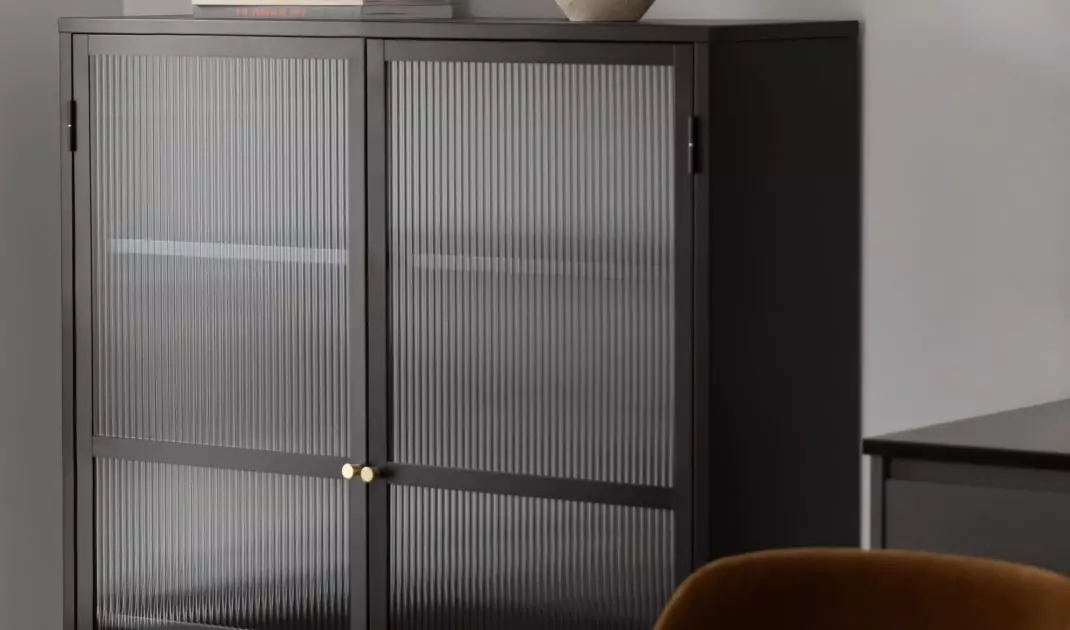 A display case is the perfect place to store tableware