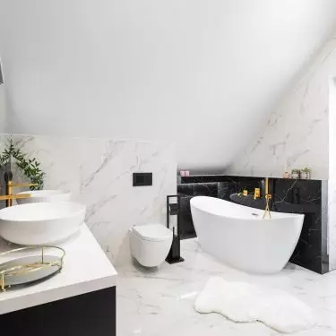 The interior is dominated by a combination of white and black
