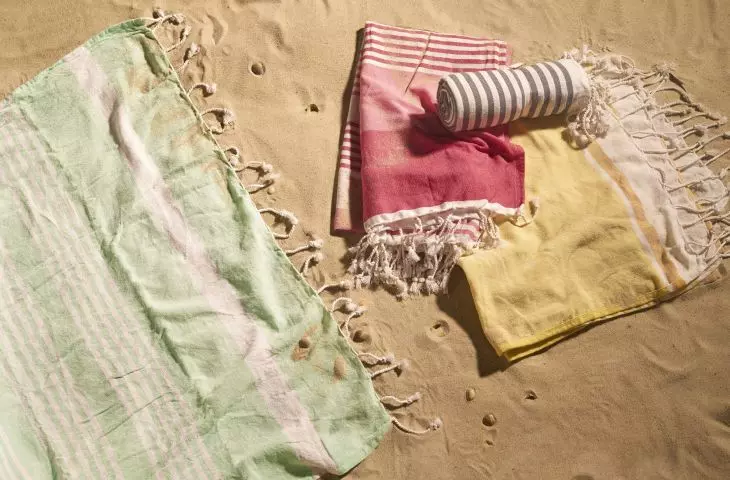 Aesthetic beach towel or blanket is an essential summer gadget