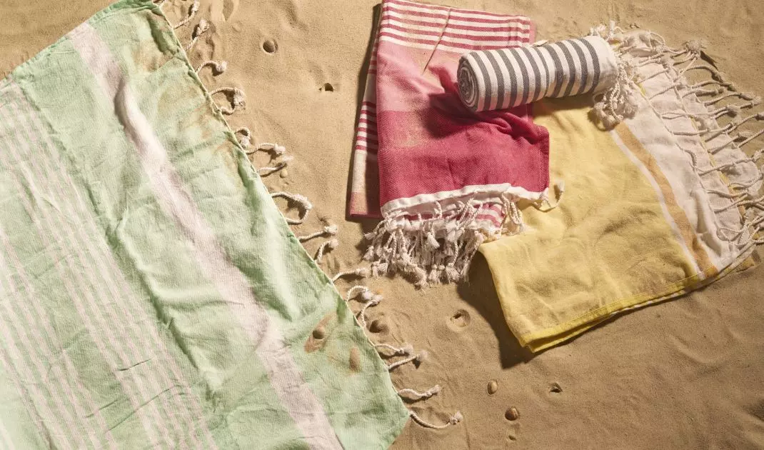 Aesthetic beach towel or blanket is an essential summer gadget