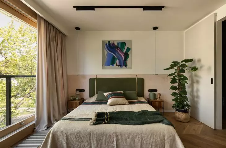 Bedroom, on the wall a painting by Dorota Dakota Pawilowska