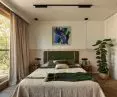Bedroom, on the wall a painting by Dorota Dakota Pawilowska