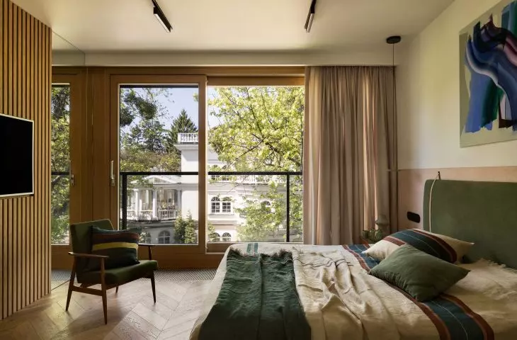 The apartment overlooks a nearby manor house