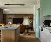 Kitchen with fluted fronts and mint accents