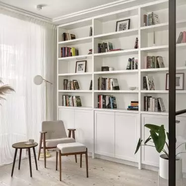 The smaller bedroom has been transformed into a reading nook