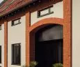 The entrance to the building leads through a portal that made the owner decide to buy the property several years ago, the designers explain