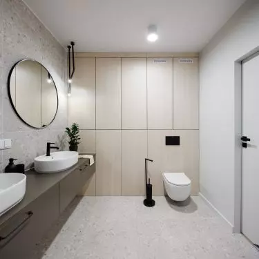 The apartment has two bathrooms: a private and a guest bathroom 