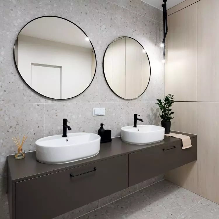 The main element of the arrangement is chocolate washbasin cabinets