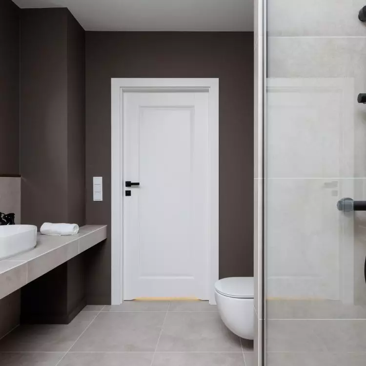 Deep brown shade warms up the space