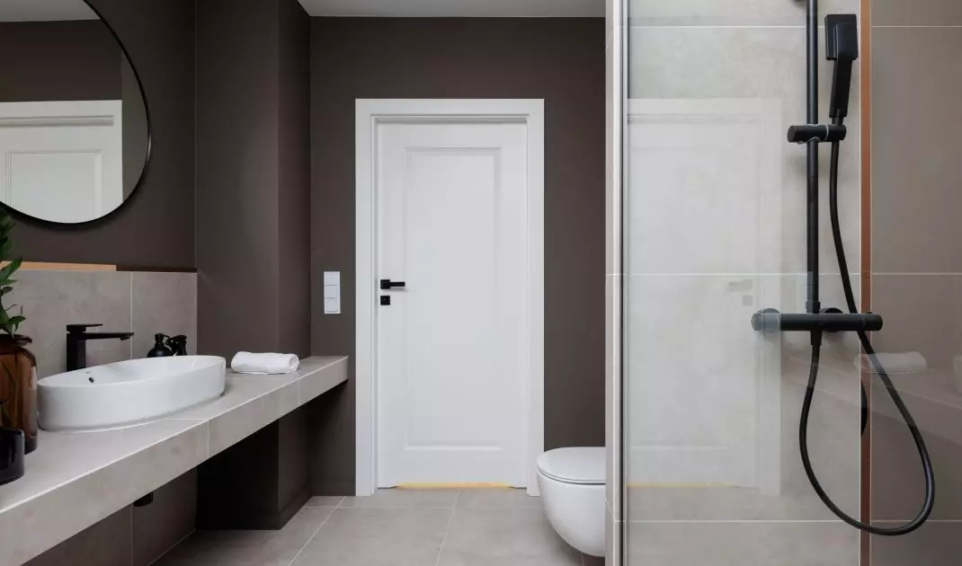 Deep brown shade warms up the space